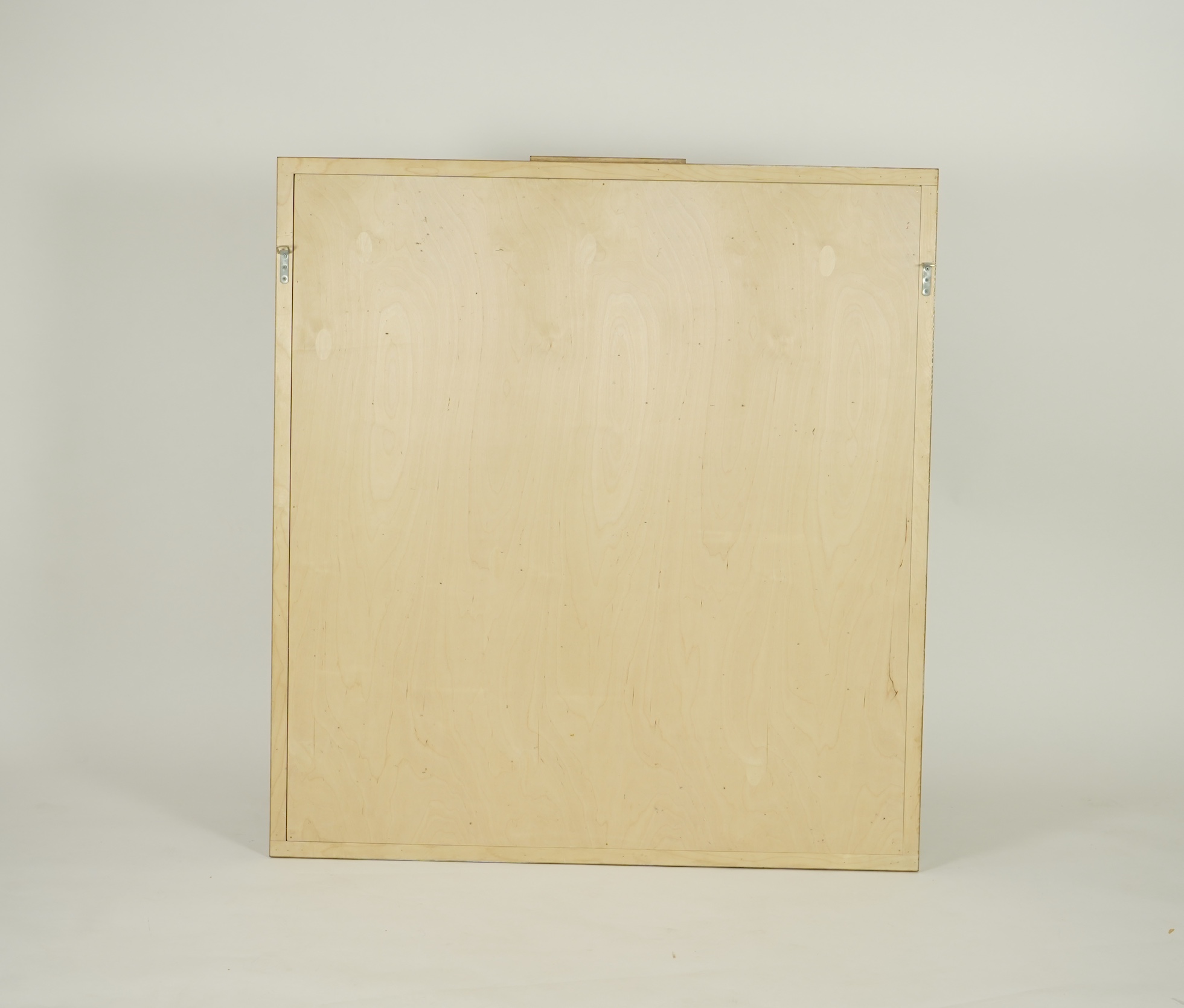 An Art Deco style sweetgum veneered rectangular overmantel mirror